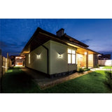 LED Wandlamp op Solar - 1 Watt - Schemersensor - 3000K - Warm wit op huis